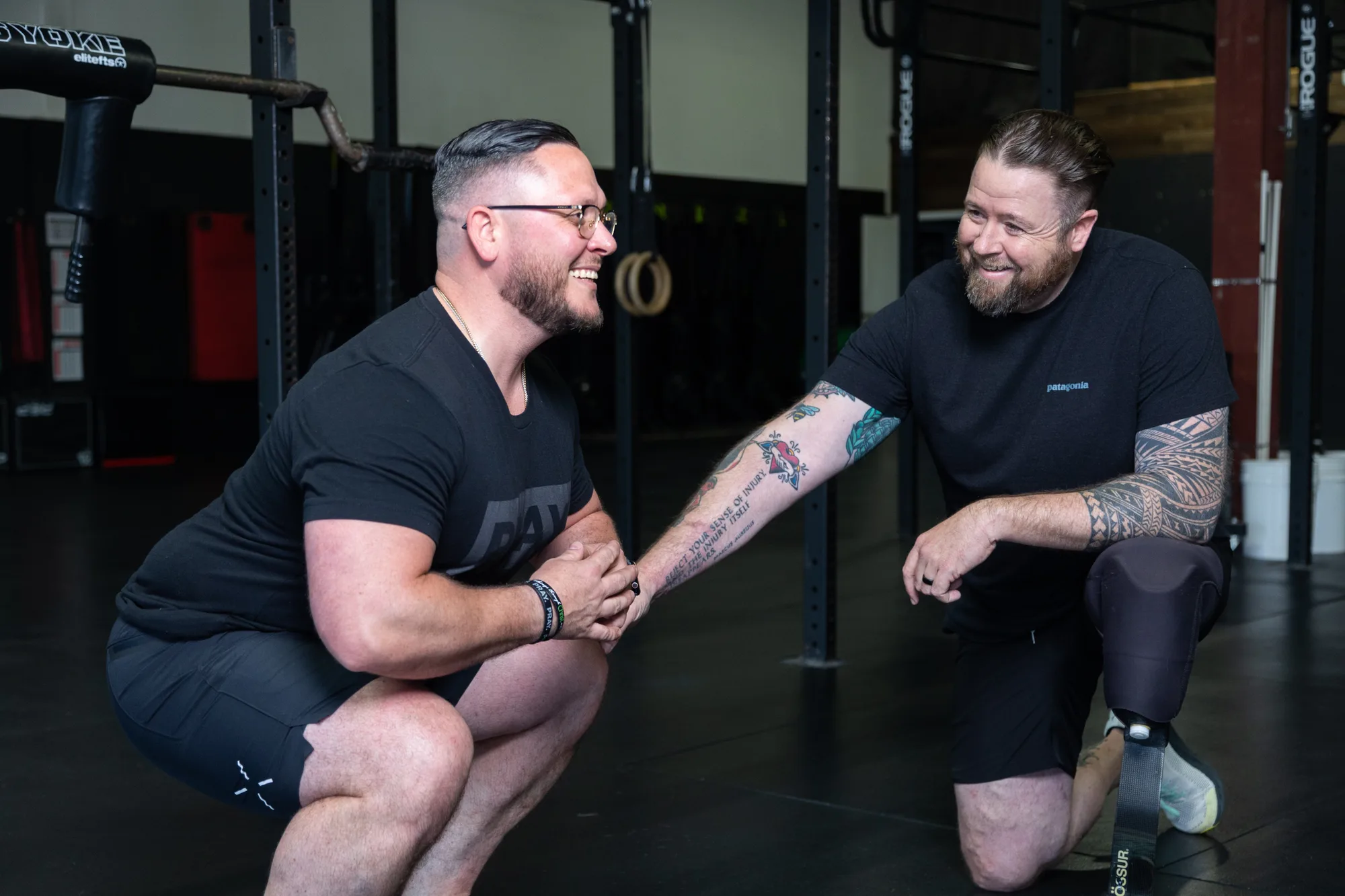 A Nova coach and an athlete talking mid-session